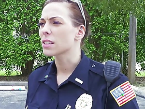 Female cops pull over black glean and suck his cock
