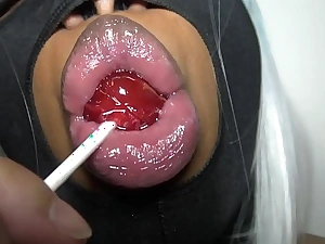 This is dslaf- dominican lipz asmr lollipop sucking with dick sucking lips