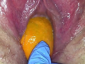 Tight pussy milf gets say no to pussy destroyed with a orange and big apple popping it relish in say no to tight hole making say no to squirt