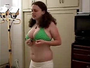 Obese girl tries exceeding bikini